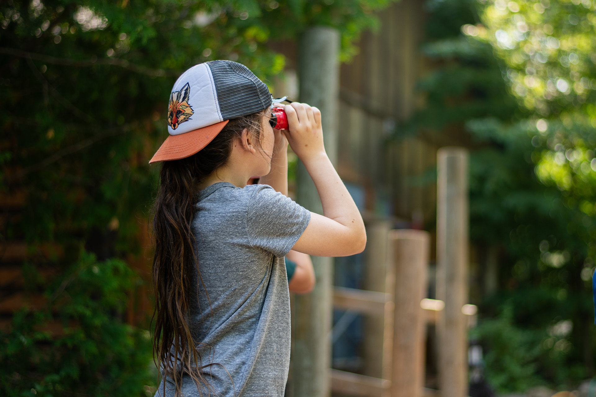 Child using binoculars